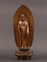 Appraisal: Gilt Buddha ca th Century Gilt wood Buddha wears a