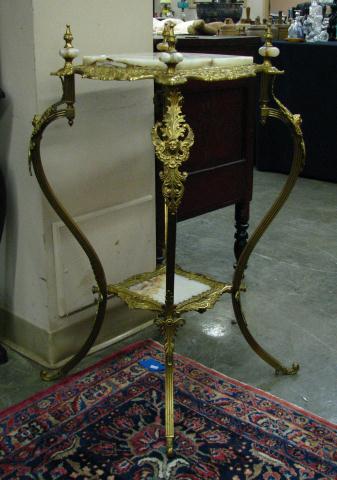 Appraisal: French cast-metal ormolu plant stand with marble inserts and marble