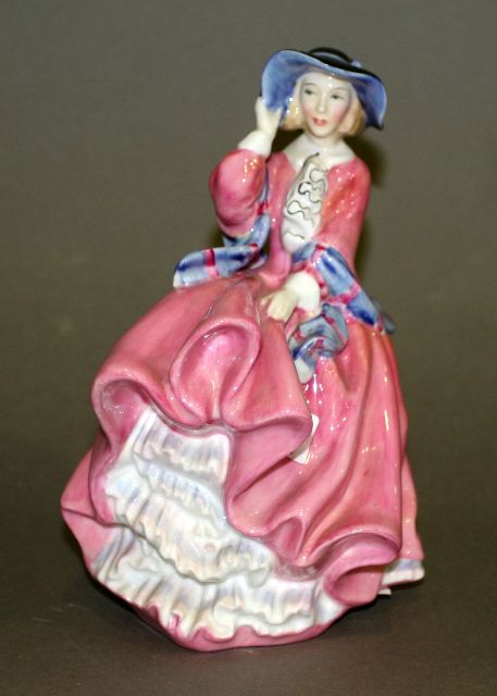 Appraisal: A Royal Doulton figure of 'Top of the Hill' painted