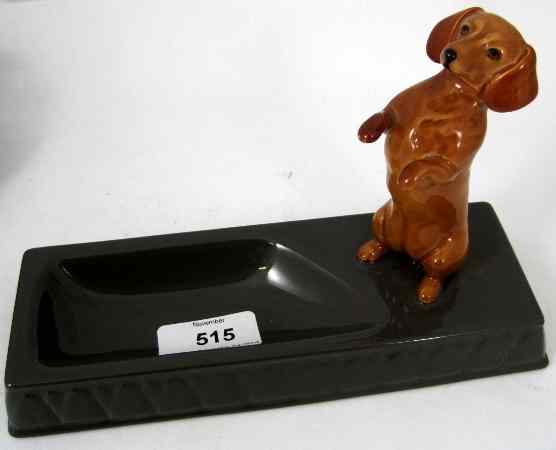 Appraisal: Beswick Dacshund Begging mounted on brown ashtray