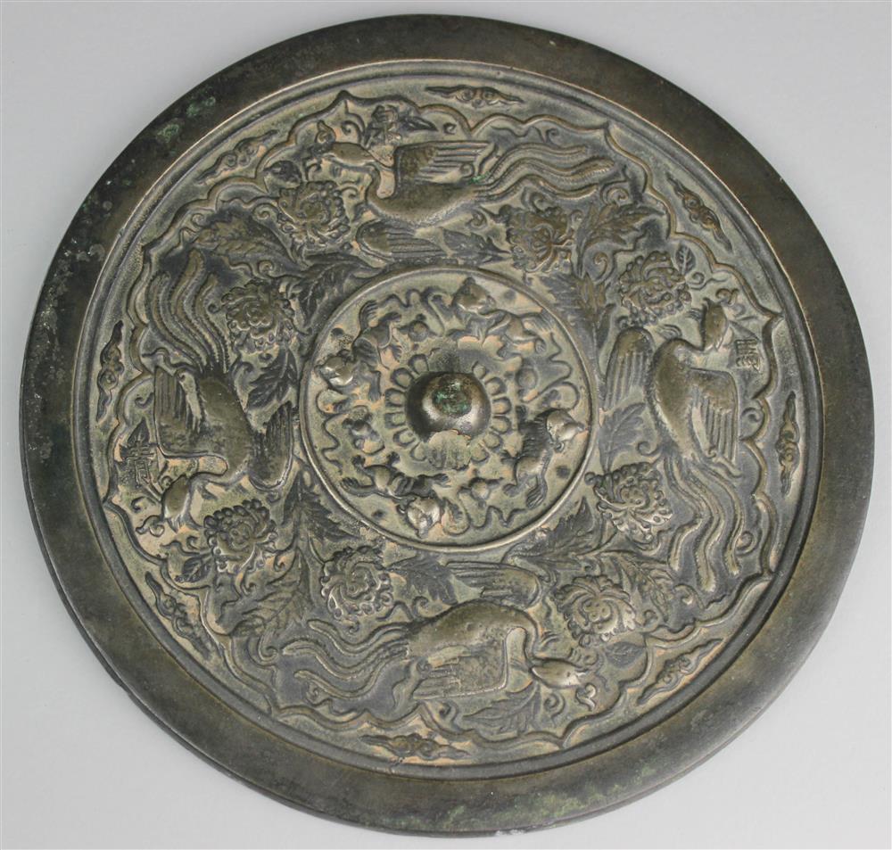 Appraisal: CHINESE SILVERED BRONZE MIRROR MING QING DYNASTY the large circular