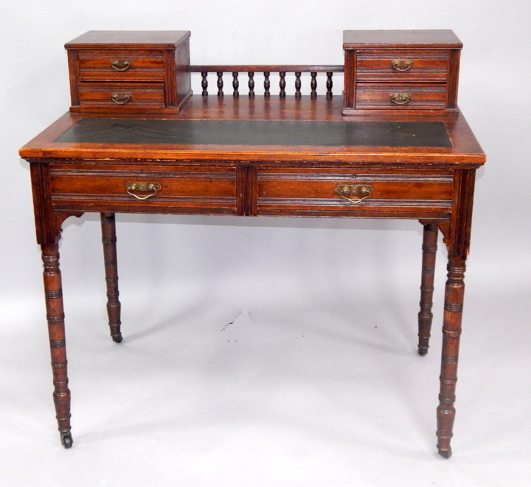 Appraisal: A Victorian oak lady's writing table the galleried back with