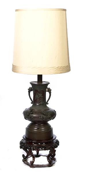 Appraisal: A large Japanese bronze vase mounted as a lamp Meiji