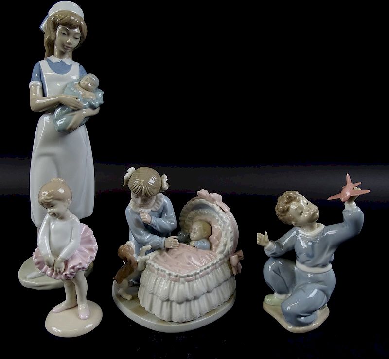 Appraisal: Collection of four Llladro Porcelain Figures Collection of four Lladro