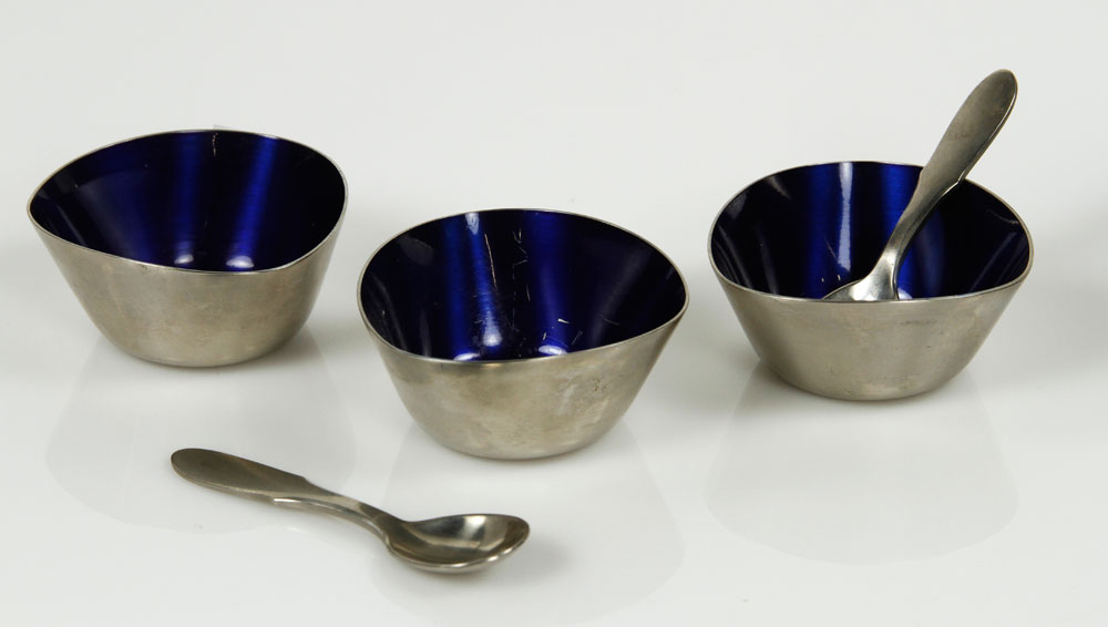 Appraisal: - Jensen Salt Cellars and Spoons Set of three Georg