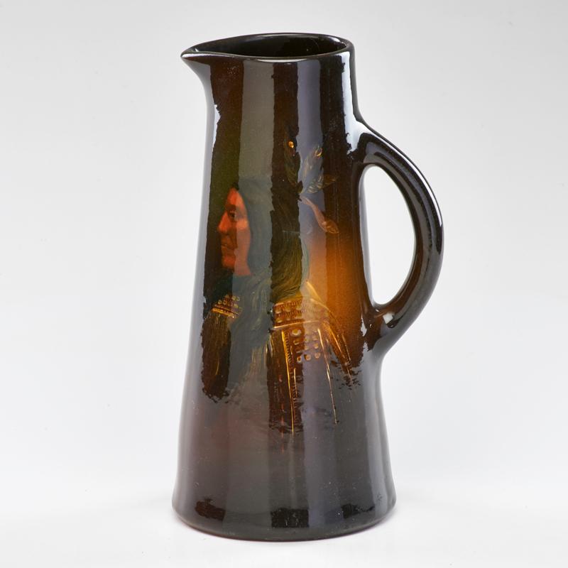 Appraisal: WELLER Louwelsa pitcher with Native American portrait Zanesville OH -