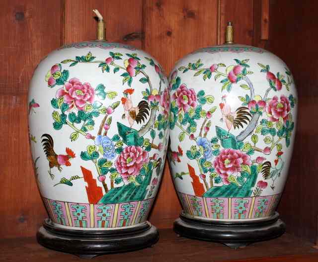 Appraisal: A PAIR OF CHINESE PORCELAIN LAMPS decorated with famille rose