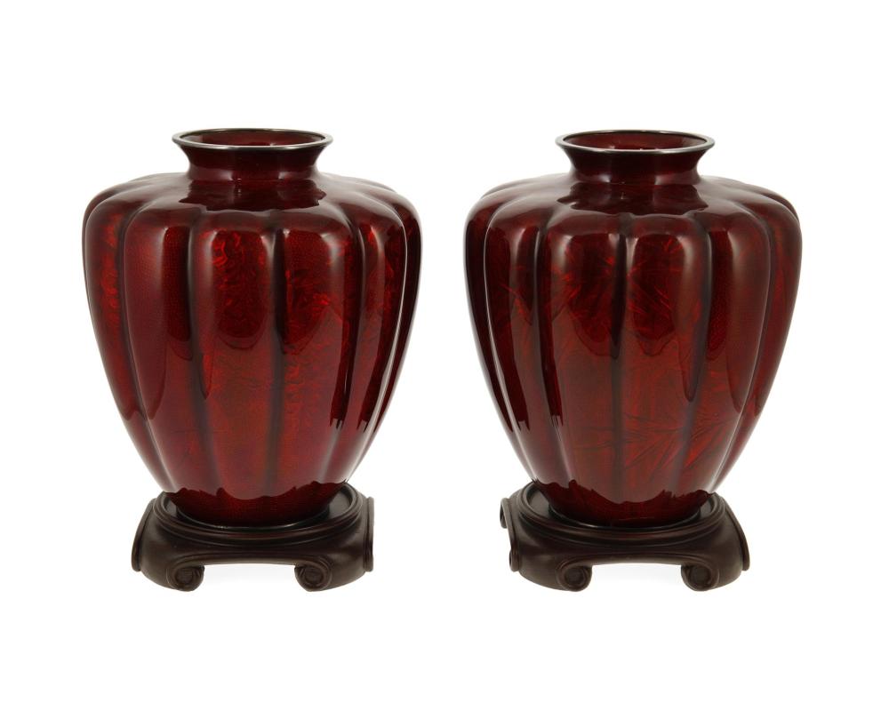 Appraisal: A pair of Japanese pigeon blood cloisonne vases Mid- th