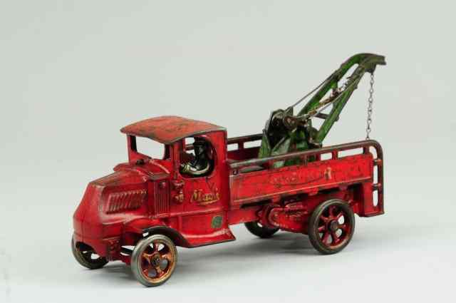 Appraisal: MACK WRECKER AND SERVICE CAR Arcade cast iron red cab