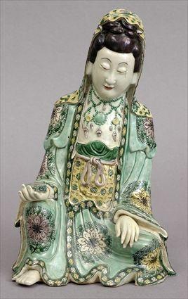 Appraisal: FAMILLE VERTE POLYCHROME BISQUE FIGURE OF KWAN YIN Modeled seated