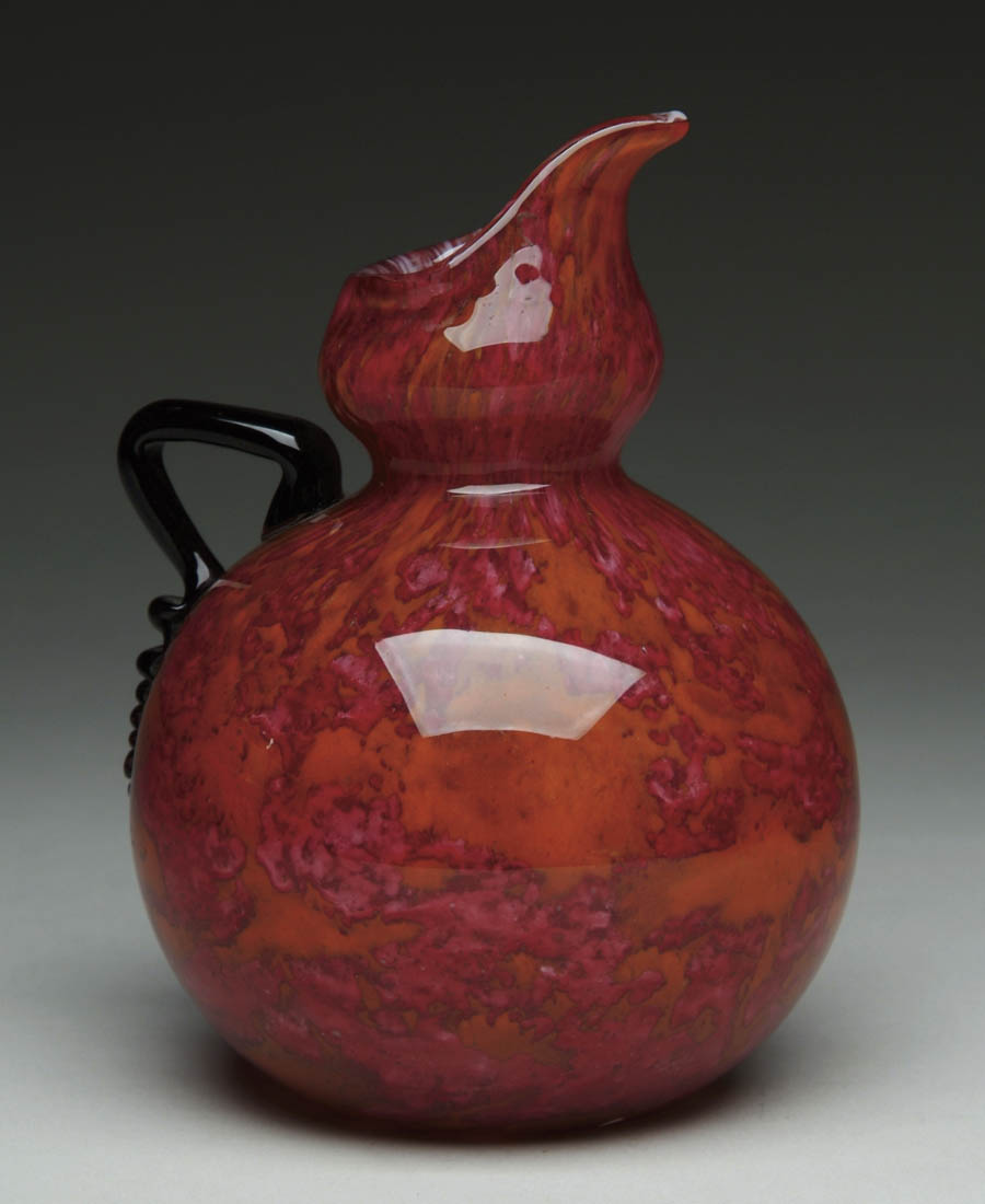 Appraisal: SCHNEIDER EWER Pretty raspberry mottling on orange Strong colors Fancy