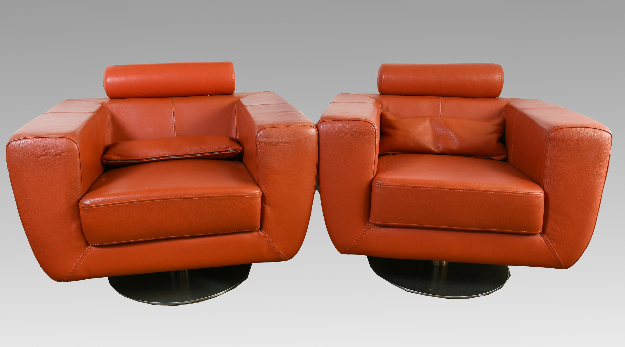 Appraisal: PAIR MODERN LEATHER CUBE SWIVEL CHAIRS Great looking terra cotta