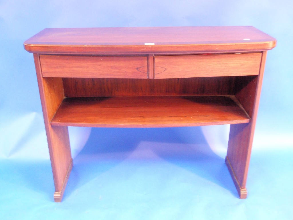 Appraisal: A modern rosewood bow front serving table cm wide