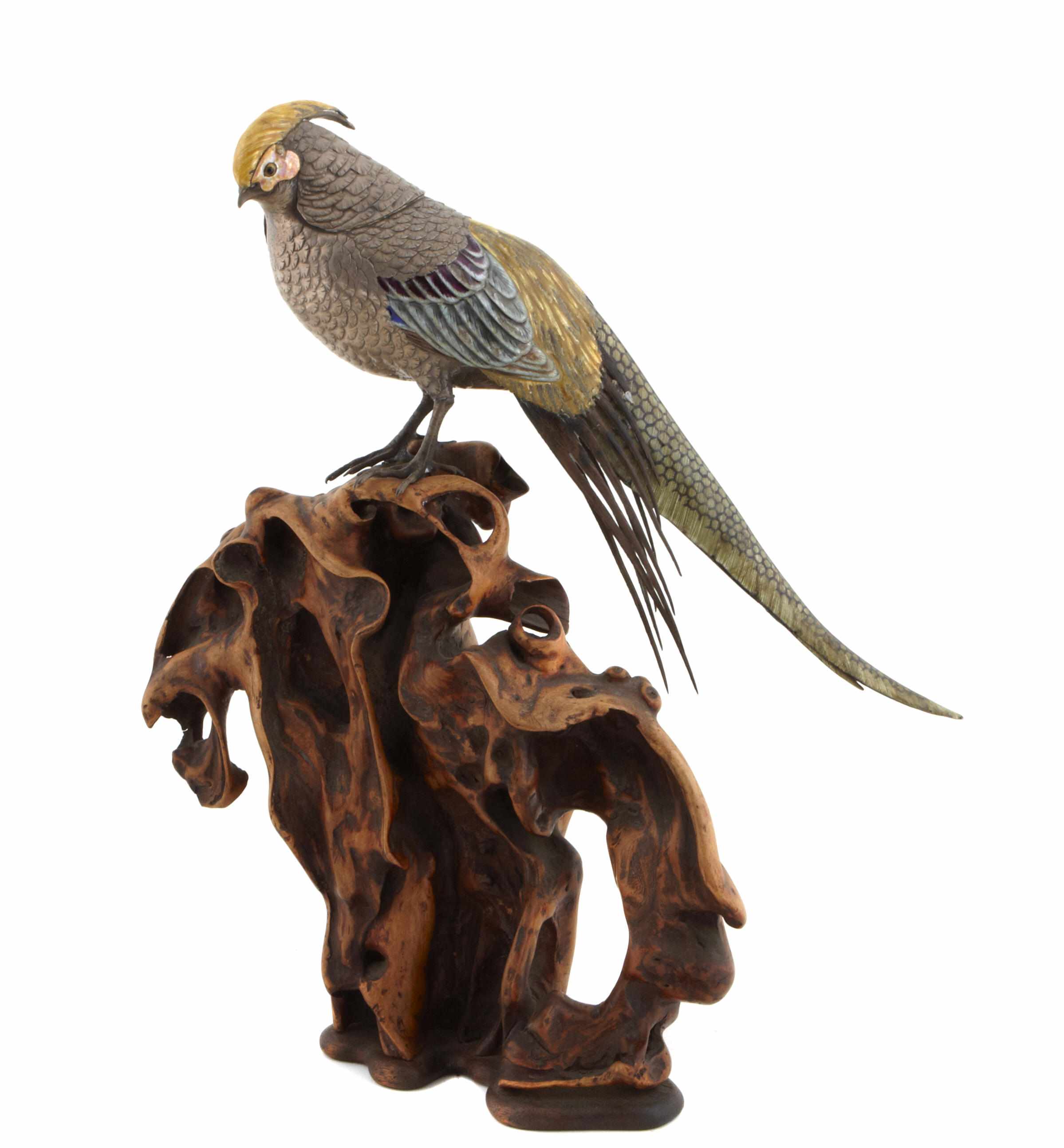 Appraisal: An enameled silver pheasant mounted on a root wood base