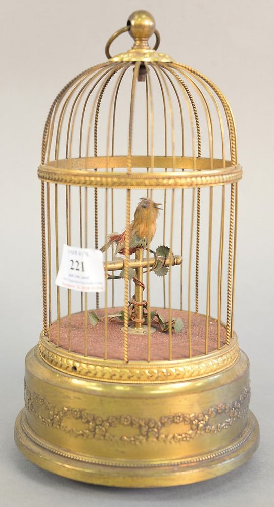 Appraisal: Singing bird in brass cage in working condition ht Singing