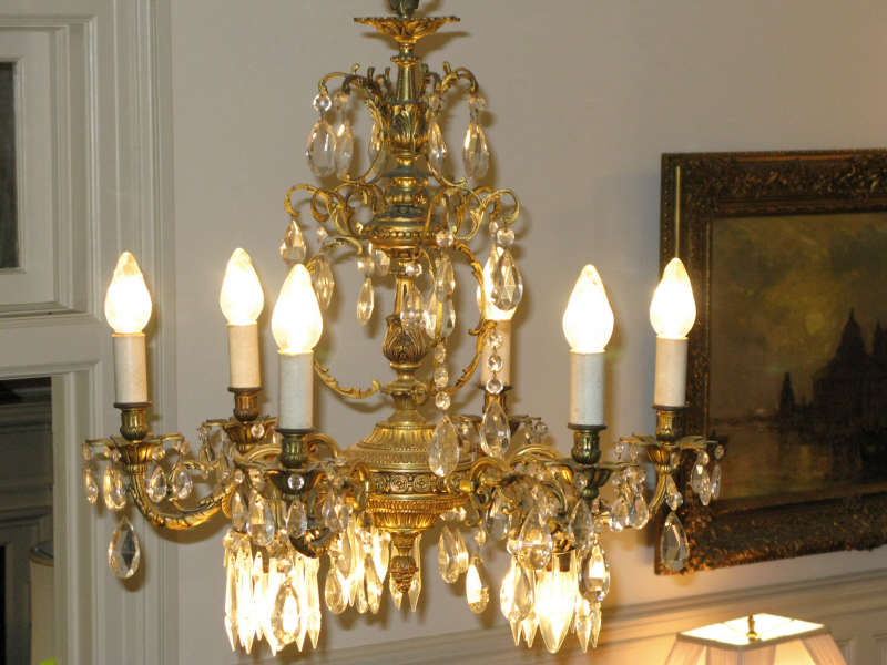 Appraisal: French Style Nine Light Chandelier ornate cast brass with lighted