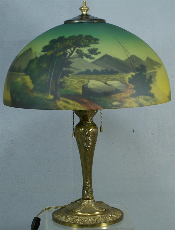 Appraisal: American table lamp with a reverse painted glass shade approximately