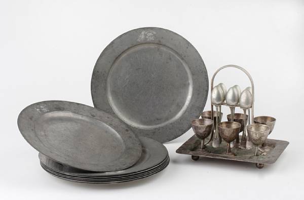 Appraisal: A Tyrone Power pewter egg serving set and plates given