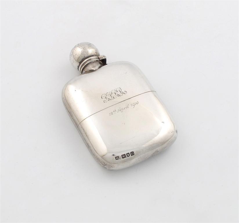 Appraisal: An Edwardian silver hip flask