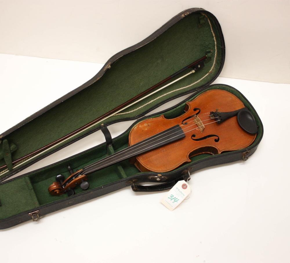 Appraisal: AFTER BARTOLOMEO GIUSEPPE GUARNERI Cremona Italy - violin with bow