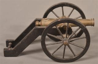 Appraisal: Vintage Cast Iron and Brass Miniature Cannon l overall