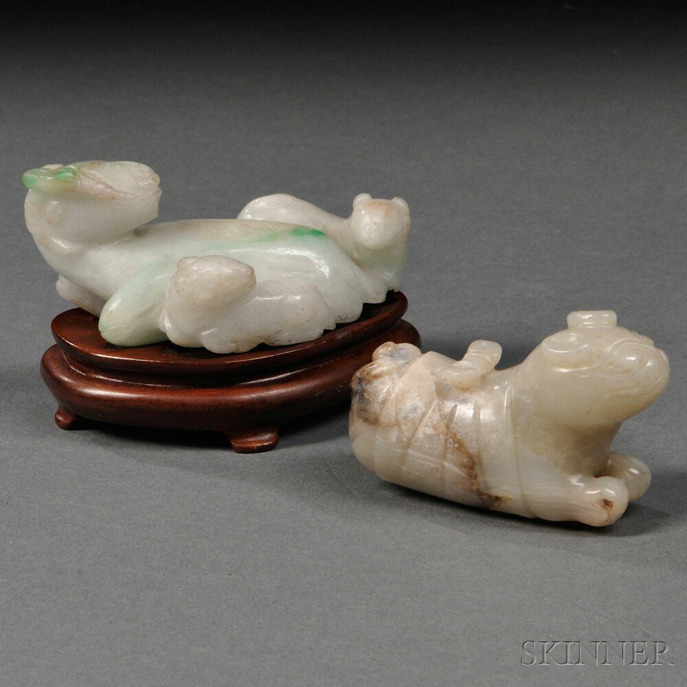 Appraisal: Two Jade Carvings of Seated Animals China th and th