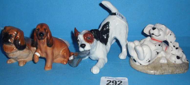 Appraisal: Royal Doulton Dogs to Include Small Seated Pekenese K Spaniel