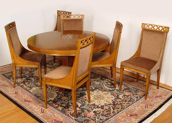 Appraisal: ROUND NEO-CLASSICAL STYLE DINING TABLE WITH CHAIRS Table with leaves