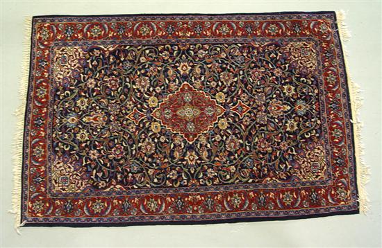 Appraisal: Wool Oriental Rug Hand tied Central medallion on navy field