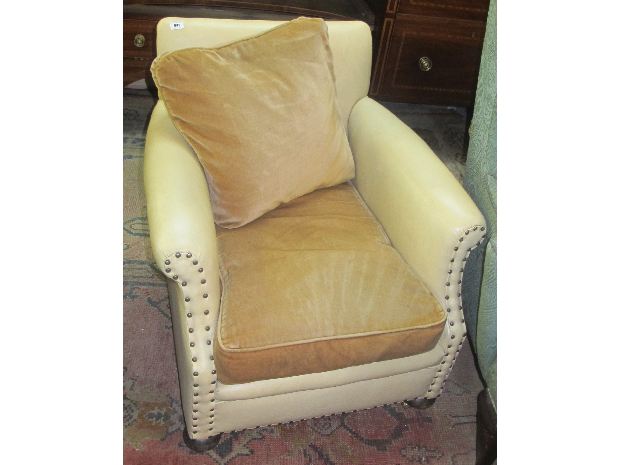 Appraisal: A white leather armchair