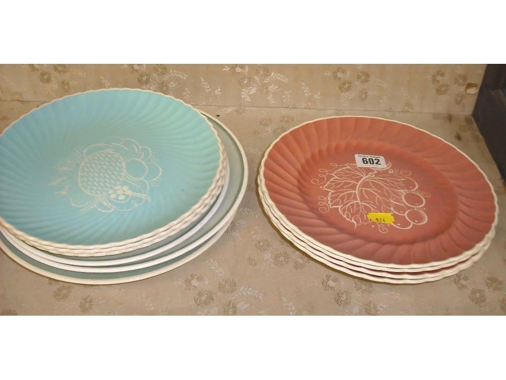 Appraisal: Set of four Susie Cooper 'Sgraffito' salmon pink spiral fluted