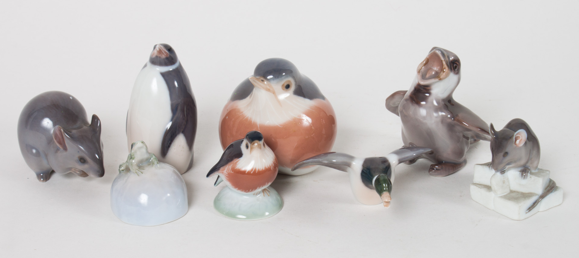 Appraisal: Eight Royal Copenhagen porcelain animals including bluebird fledgling bird mouse