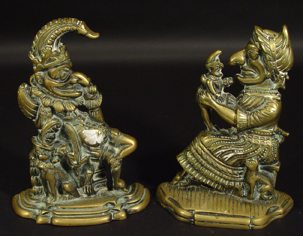 Appraisal: Pair of brass Mr and Mrs Punch doorstops the largest