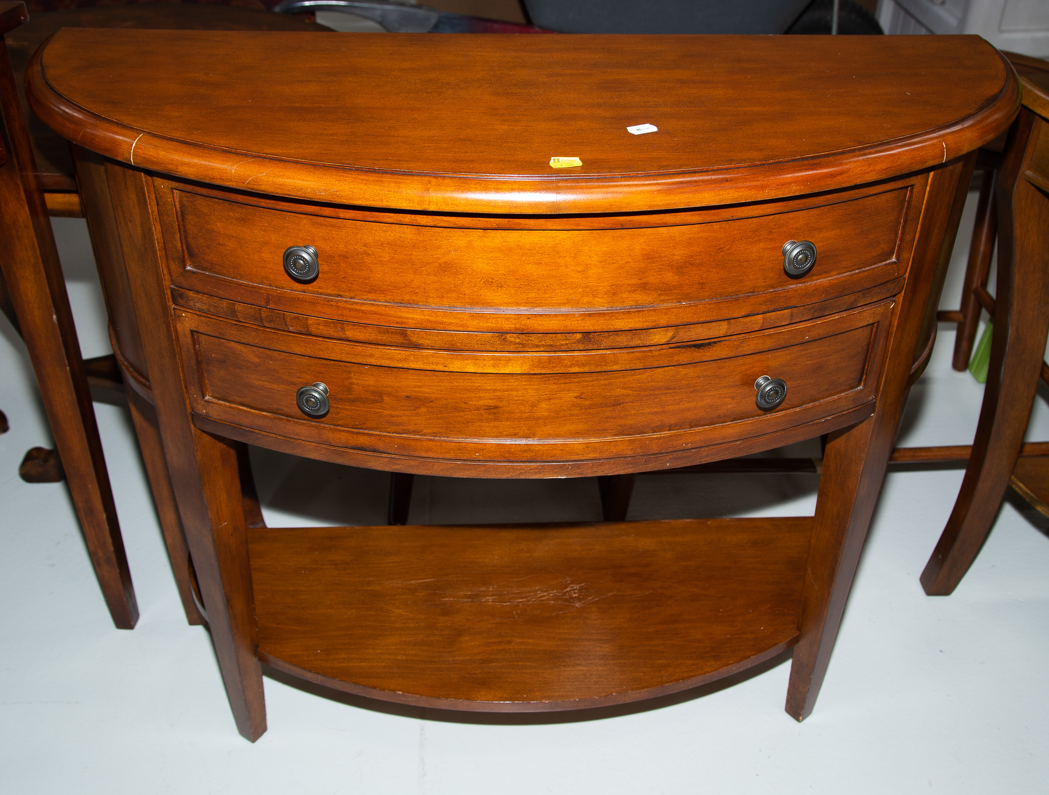 Appraisal: A TWO-DRAWER DEMILUNE CONSOLE TABLE in H in W in