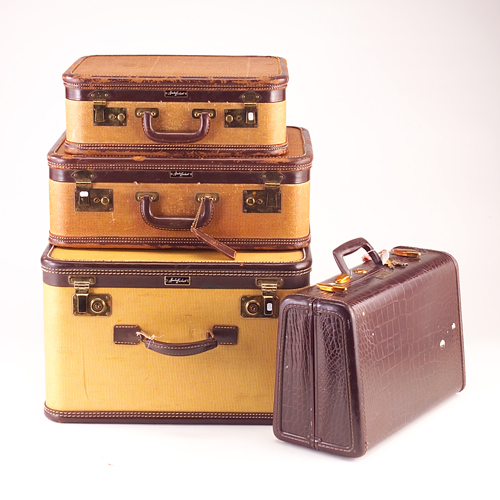 Appraisal: Four vintage suitcases to include a faux crocodile case by