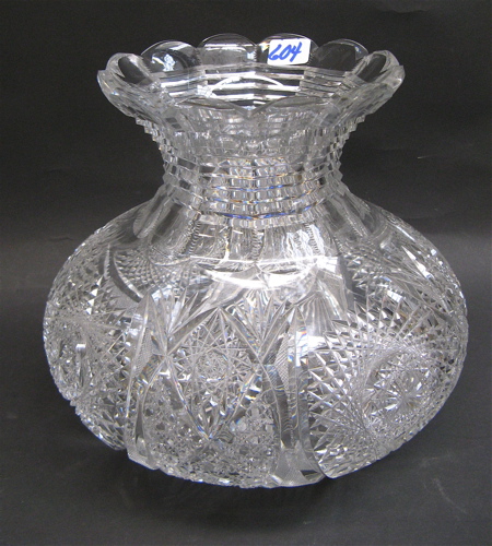 Appraisal: AN AMERICAN HAND CUT AND ENGRAVED GLASS VASE The bulbous