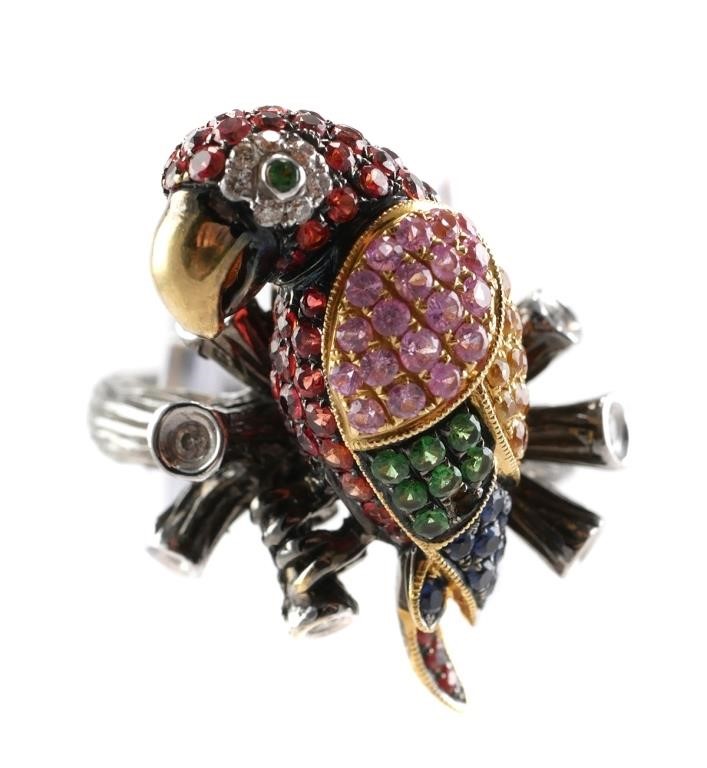 Appraisal: K white yellow gold ring with jeweled parrot One green