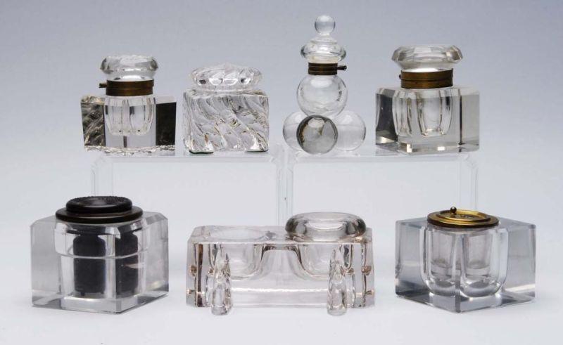 Appraisal: Lot of Lead Crystal Inkwells Description Five inkwells include lids