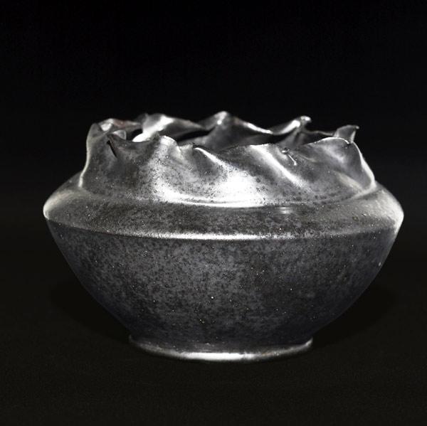 Appraisal: GEORGE OHR Squat vessel with pinched floriform rim covered in