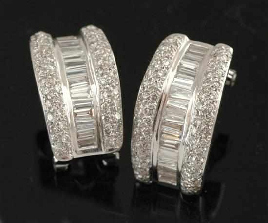 Appraisal: A pair of diamond earrings Each half hoop set with