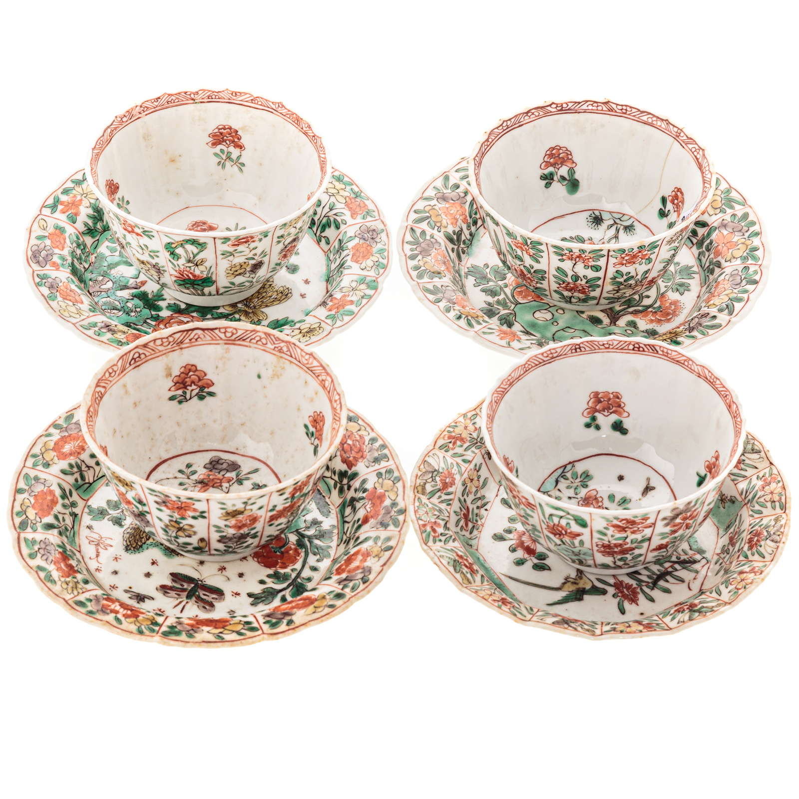 Appraisal: FOUR CHINESE EXPORT FAMILLE VERTE CUPS SAUCERS Kang Xi circa