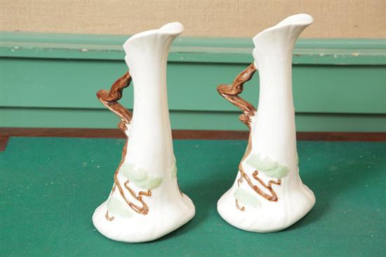 Appraisal: PAIR OF ROSEVILLE EWERS In white Ming Tree pattern and