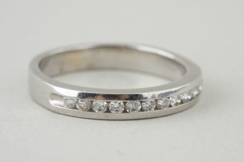 Appraisal: KT White Gold Diamond Wedding Band with round brilliant cut