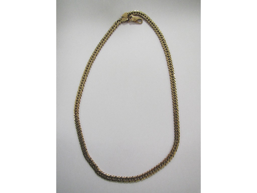 Appraisal: Nine carat gold flat curb link neckchain Approximately inches gms