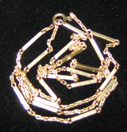 Appraisal: K YELLOW GOLD CHAIN With link and bar design Approximately