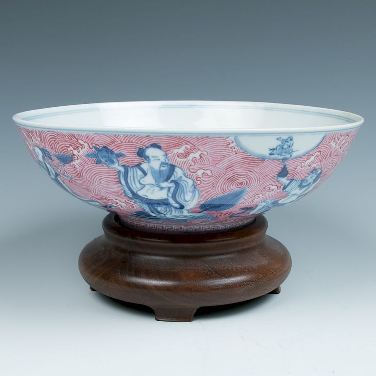 Appraisal: BLUE WHITE AND PUCE ENAMELED BOWL TH C Well-spotted with