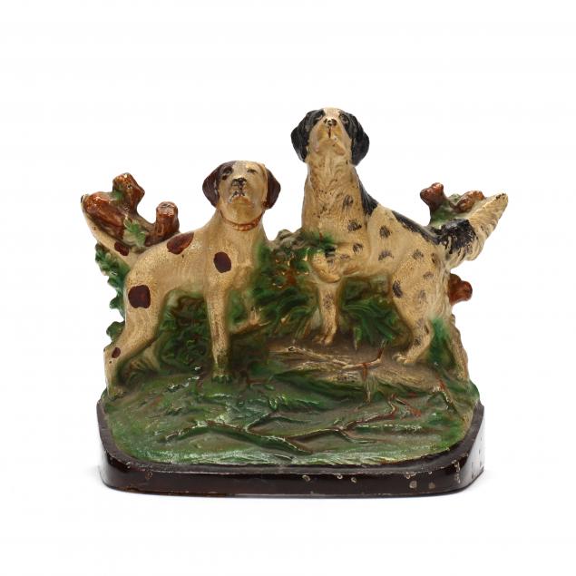 Appraisal: HUBLEY CAST IRON DOORSTOP OF TWO DOGS Circa s hand-painted