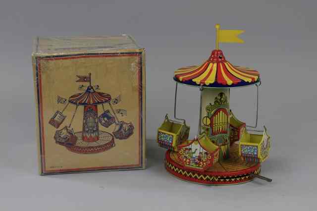 Appraisal: AERO SWING WITH BOX Chein lithographed tin colorful graphics features