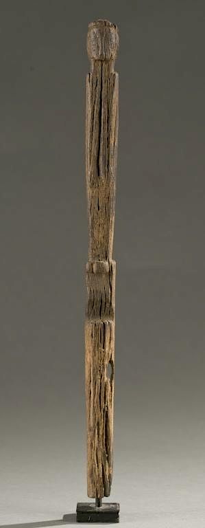 Appraisal: West African cylindrical figure th th c A desiccated cylindrical