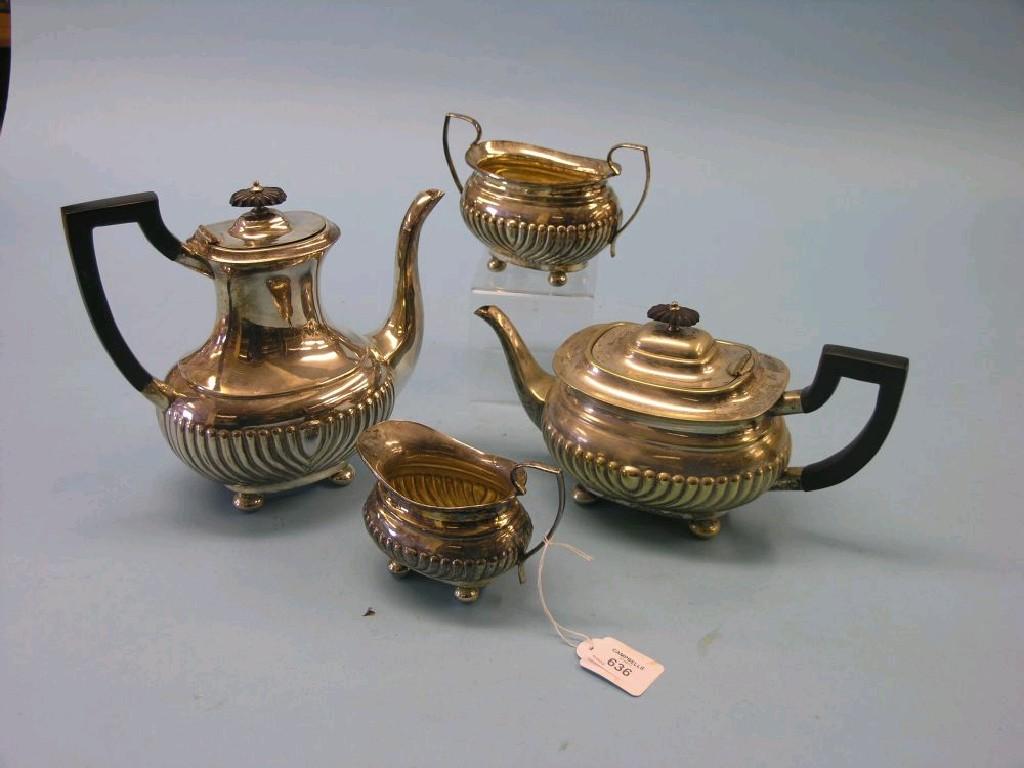 Appraisal: A silver plated teaset four pieces oval half-fluted form